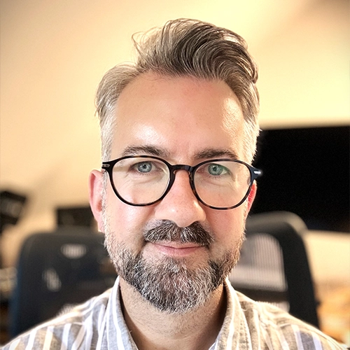 Dr Chris James
